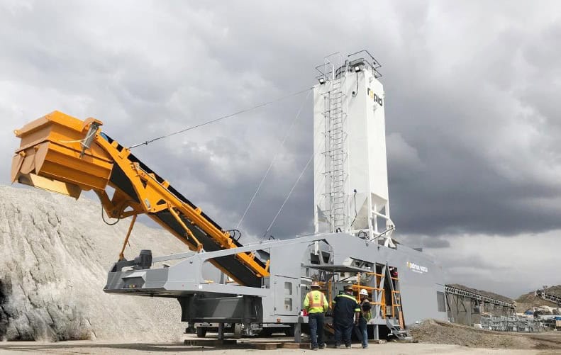 Mobile concrete batching plant operating at a quarry and construction